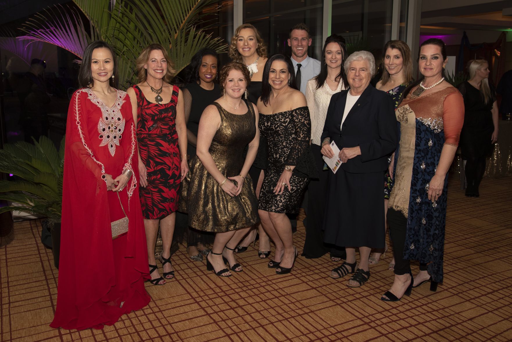 BLOOM Event Committee: Tyan Tan Ragone, Rita Diekemper, Gabrielle Ballard, Nikol Kokaz Oztok, Craig Schrock, Courtney Noto, Sr. Helen Negri, Tasha Davis, Liesel Duhon, Co-ChairsÊAmber Pook and Erin Rataj